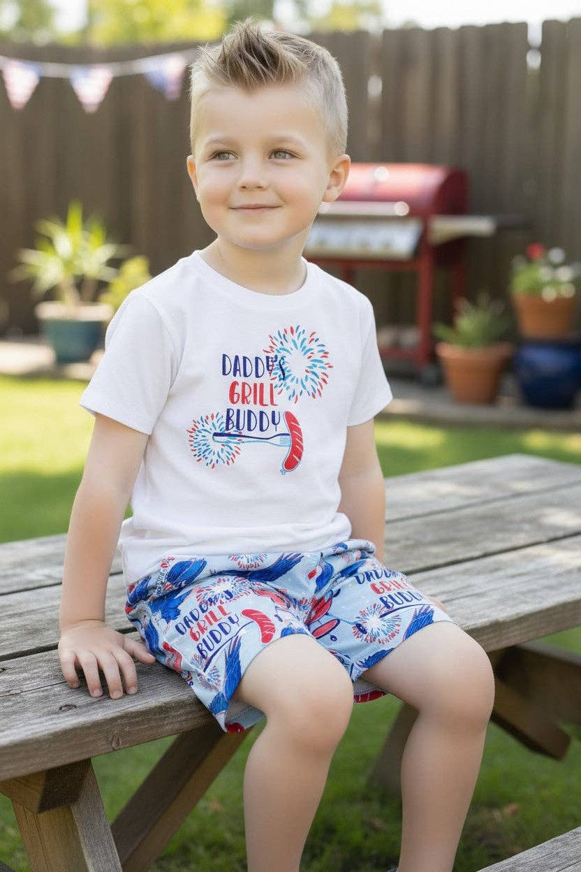 "Daddy's Grill Buddy" White T-shirt & blue multi printed shorts.