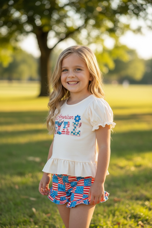 "American Girl" Ivory ruffle top and flag printed shorts with ruffle detail.