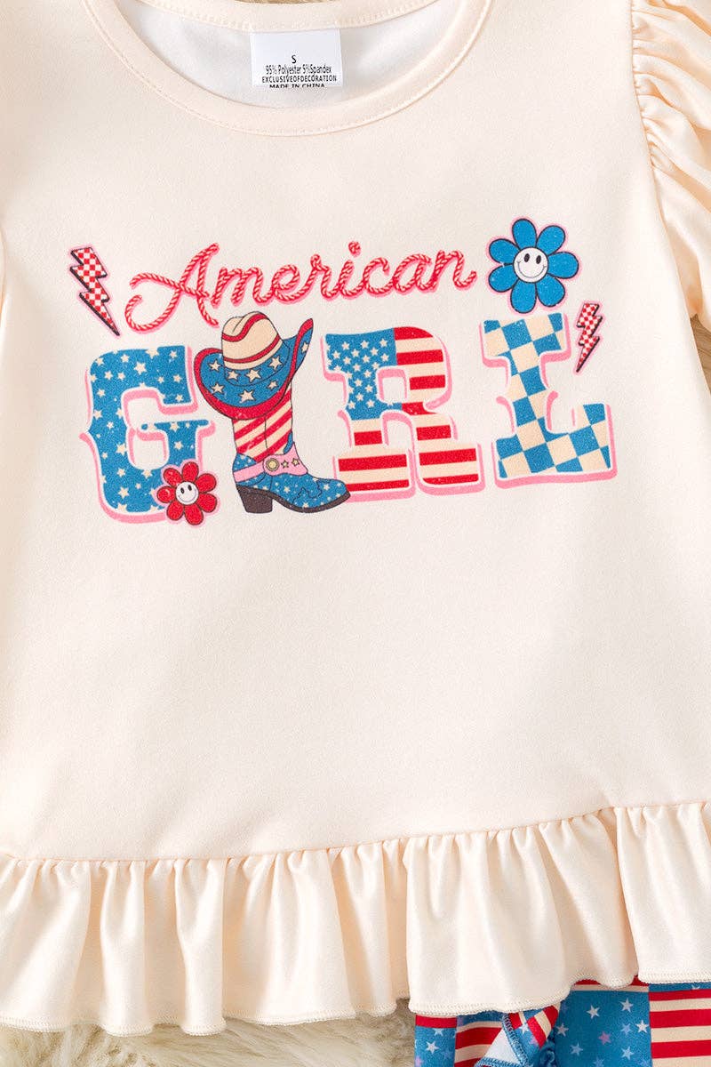 "American Girl" Ivory ruffle top and flag printed shorts with ruffle detail.