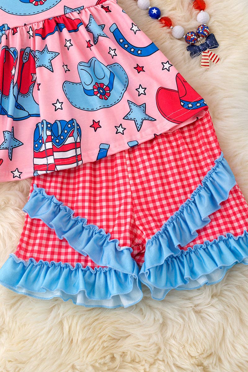 Western cow girls pink tunic with red gingham shorts.