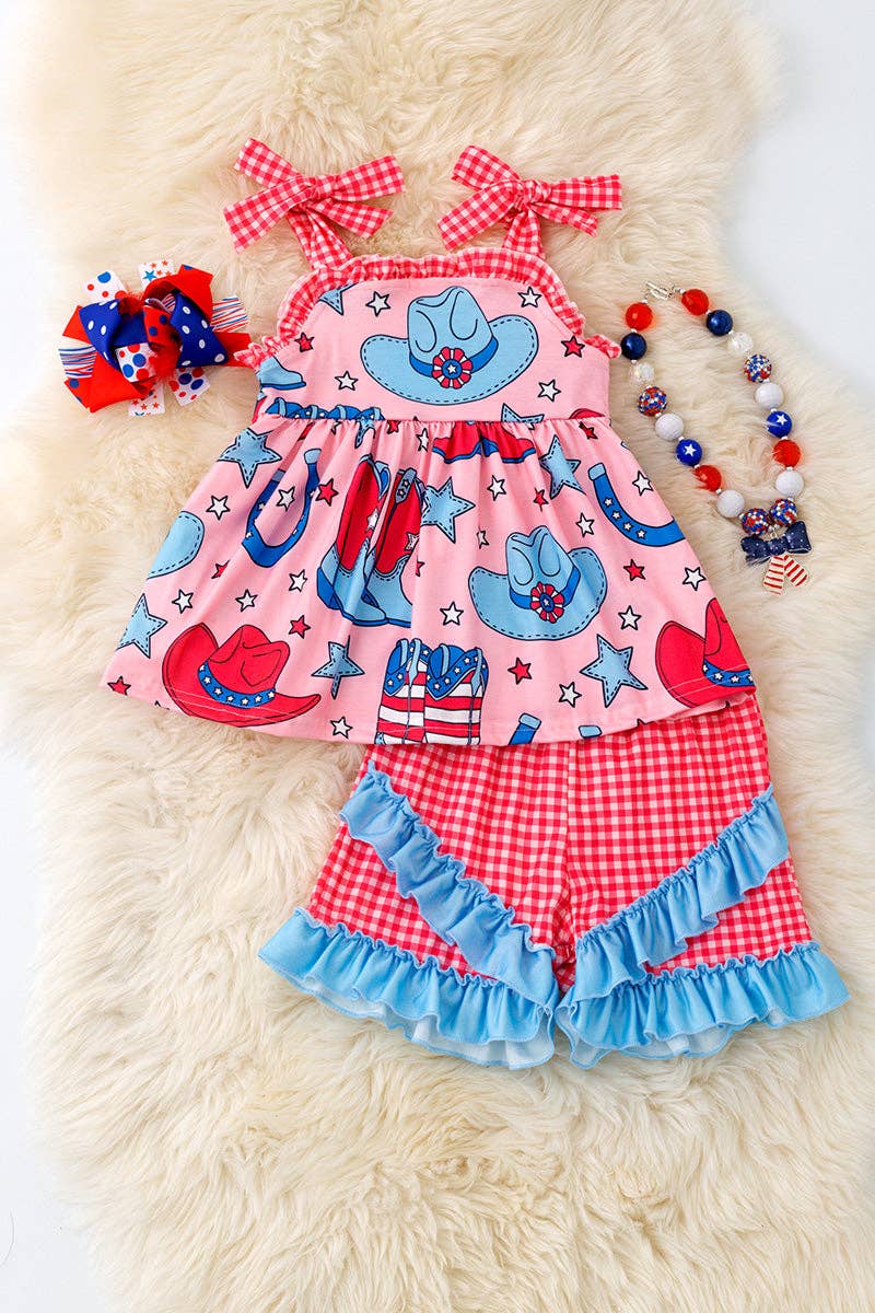 Western cow girls pink tunic with red gingham shorts.