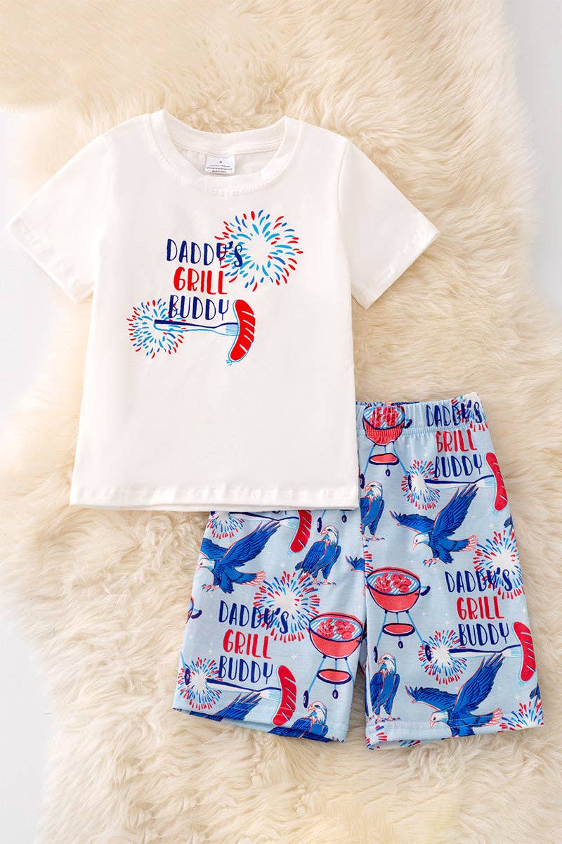 "Daddy's Grill Buddy" White T-shirt & blue multi printed shorts.